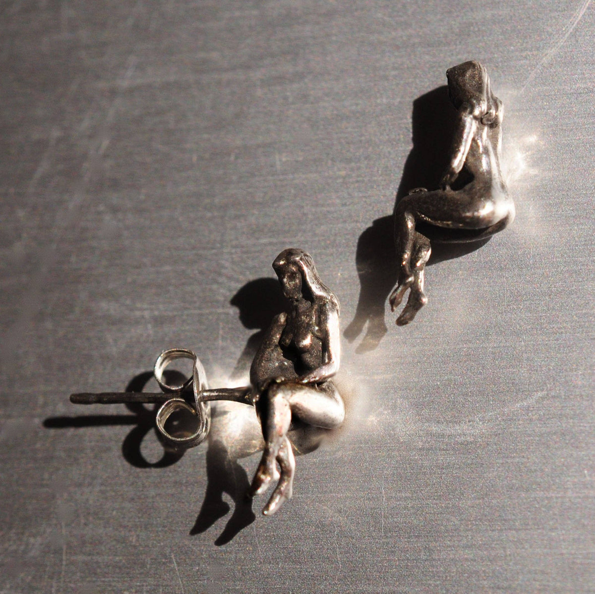 OZMA adornments - Fatal Stud Earrings (Nude woman): Silver - PMA Store at the Portland Museum of Art, Maine