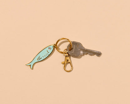 And Here We Are - Enamel Keychain & Bag Charm—Sardine (Tin Fish, Foodie Gift) - PMA Store at the Portland Museum of Art, Maine