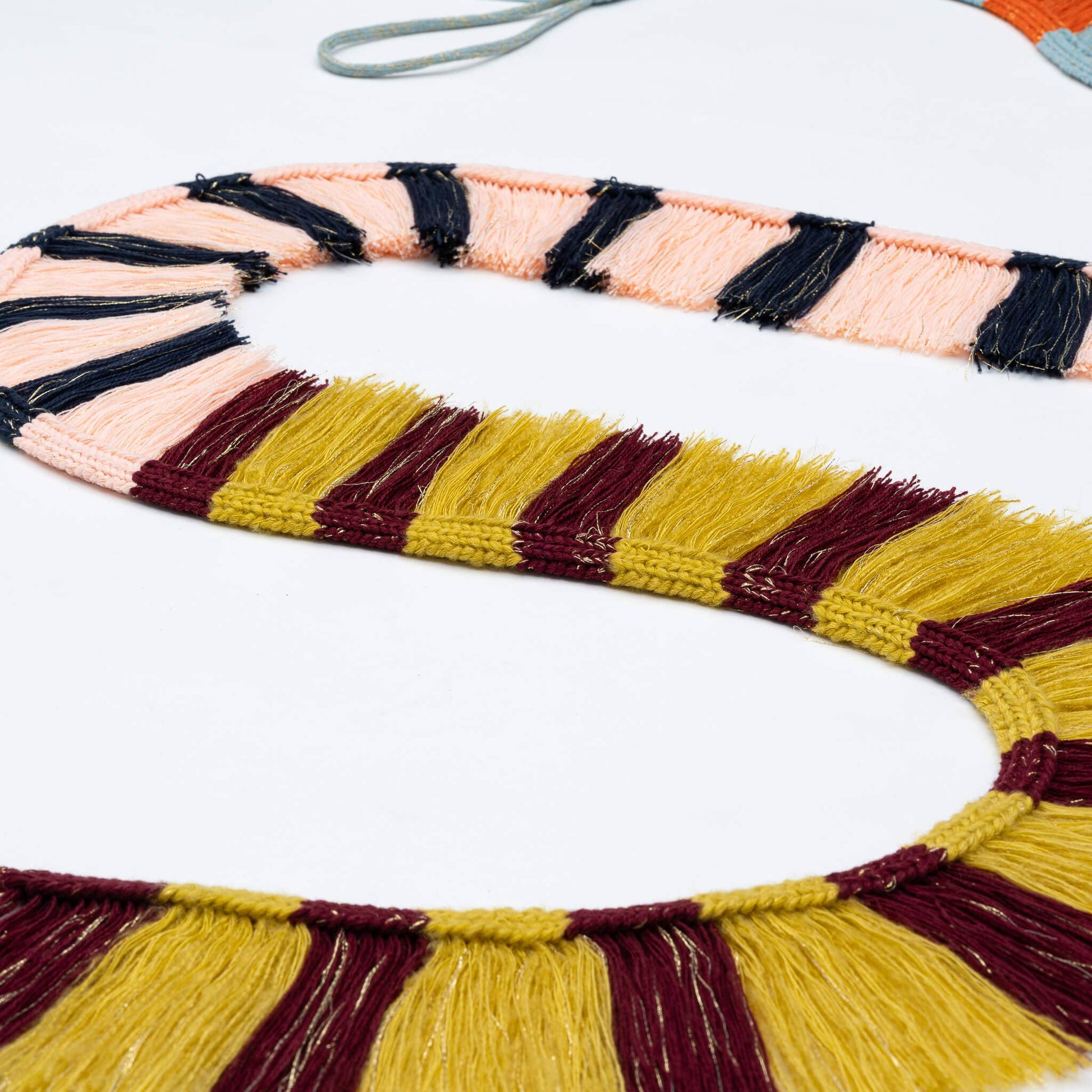 Patchwork Stripe Fringe Garland: Desert - PMA Store at the Portland Museum of Art, Maine